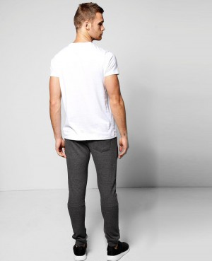 SKINNY FIT WAFFLE JOGGERS WITH ZIP POCKETS